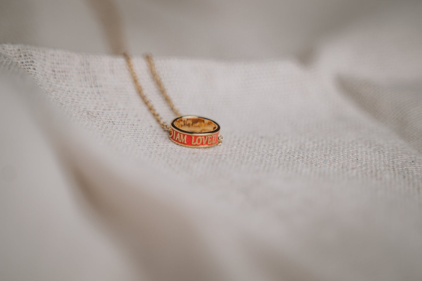 Gold enamelled pendant with chain